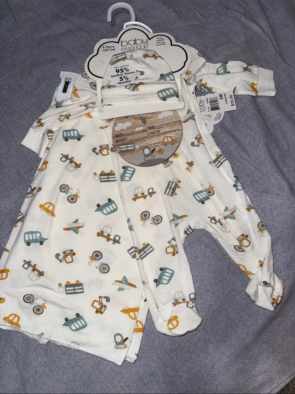 Footie, swaddle, knit cap, wood disk 4 piece gift set